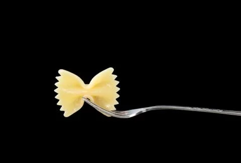 Old fork with farfalle Stock Photos