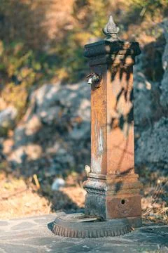 Old fountain for drinking Stock Photos