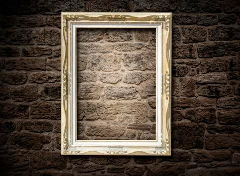 Old frame on a brick wall Fotos de archivo