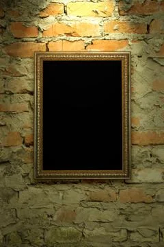 Old frame hanging on the wall Stock Photos