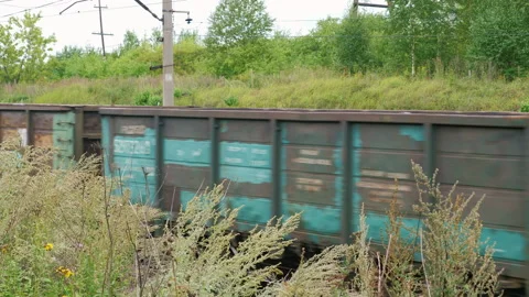 Old freight train rides on railways Video stock 154697562