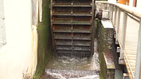 Old functioning moss covered wood watermill Stock Footage 263645606