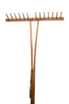 Old garden rake on white background Stock Photos