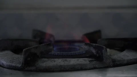 Old gas burner, gas diffuser on stove, close-up Video stock 289440221