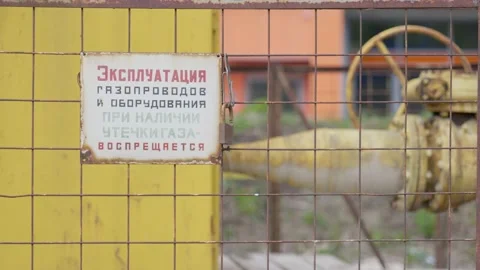 Old gas pipe valve sunlight video industrial old rusty the pipe outdoor. Video stock 130842673