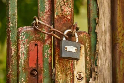 Old gat with padlock Stock Photos
