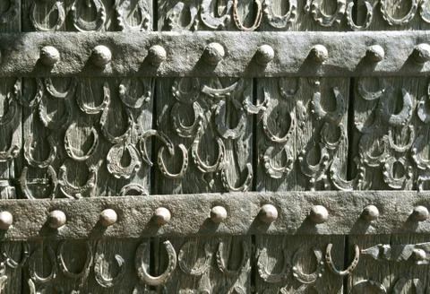 Old gate with horseshoe Stock Photos