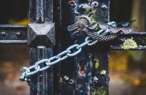 Old gate locked with chain Stock Photos