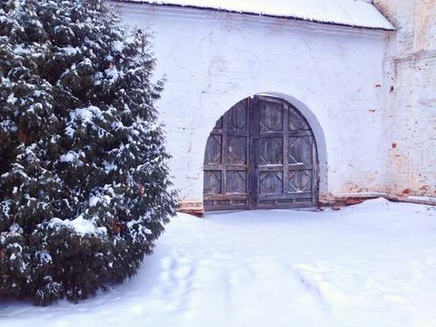Old gate of monastery in winter Stock Photos