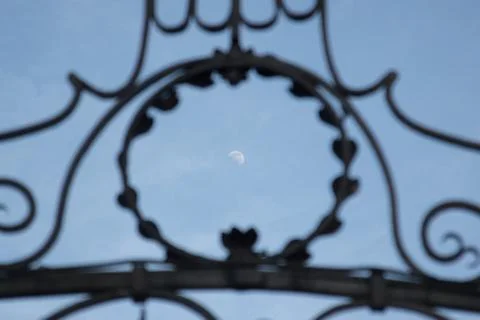 Old gate with texture and moon with clear sky in background Stock Photos
