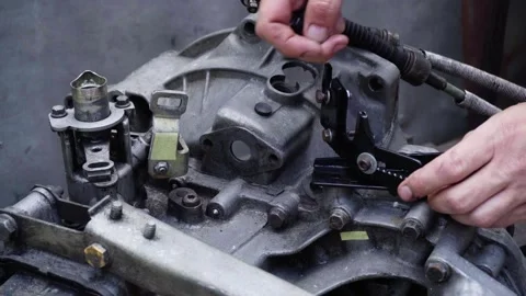Old gear shift box from a front-wheel drive car Stock Footage 336733049