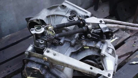 Old gear shift box from a front-wheel drive car Stock Footage 336733491