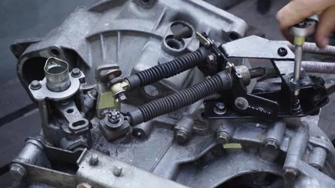 Old gear shift box from a front-wheel drive car Stock Footage 336733688