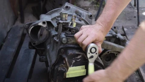 Old gear shift box from a front-wheel drive car Stock Footage 336733728