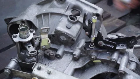 Old gear shift box from a front-wheel drive car Stock Footage 336733729