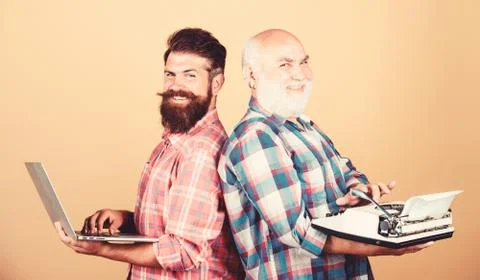 Old generation. Digital technologies. Battle of technologies. Master new Foto stock