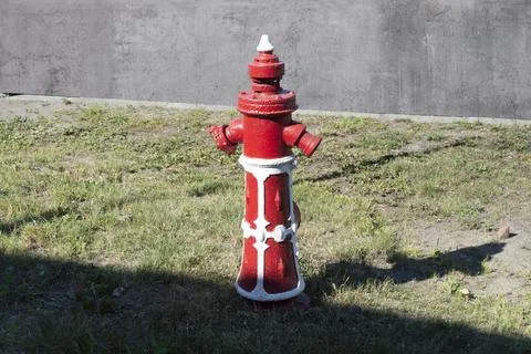 Old german fire hydrant standing on the street Stock Photos