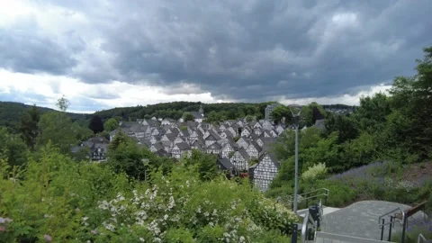 Old German town with half-timbered houses on a cloudy day in 4K Stock Footage 196942760