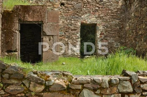 Old ghost town doors with secret passage Stock Photos