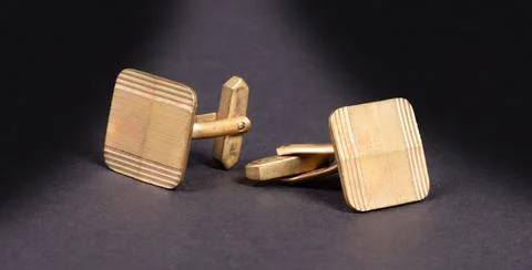 Old gilded cufflinks Stock Photos