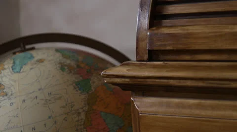 Old globe close-up. Smoothly pan left, tilt down, rack-focus in. HD 1080p 24fps. Stock Footage 22724735