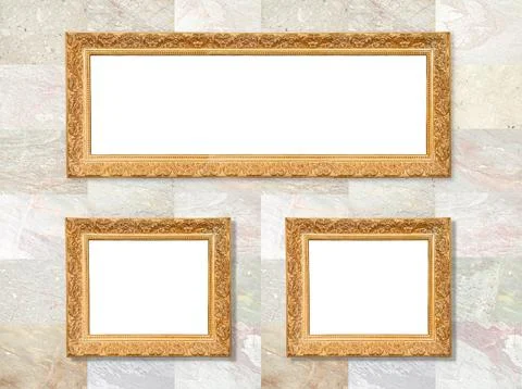 An old gold frames hanging on a marble wall, background Stock Illustration