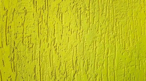 Old gold plaster wall texture yellow background. Textured textured wall plast Stock Photos