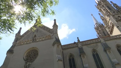 Old gothic cathedral on a summer day with blue sky Stock Footage 108437547