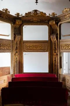 Old gothic gold frame wall decor in old architecture Stock Photos