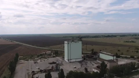 An old grain elevator. Agro enterprise of the past generation. Aerial view Stock Footage 251648845