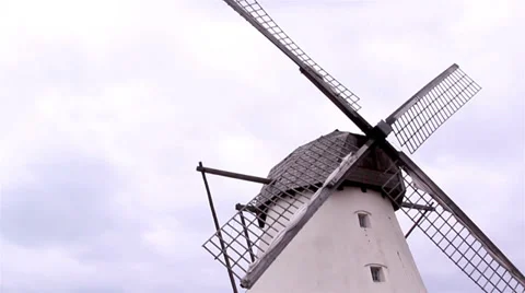 The old grain mill and the wind mill Stock Footage 37438824