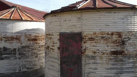 Old grain silos and red barn aerial drone pedestal rise autumn 4K Stock-Footage 219759220