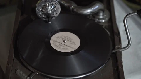An old gramophone is playing a record. Stock Footage 115849873