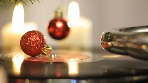 An old gramophone playing under a decorated Christmas tree Stock Footage 95463752
