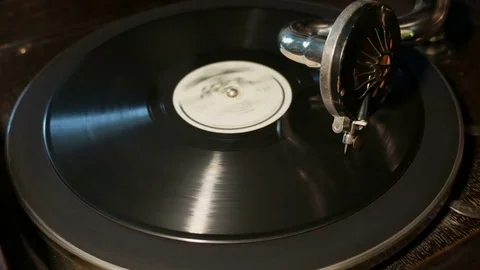 Old gramophone playing vinyl disc Stock Footage 83519525
