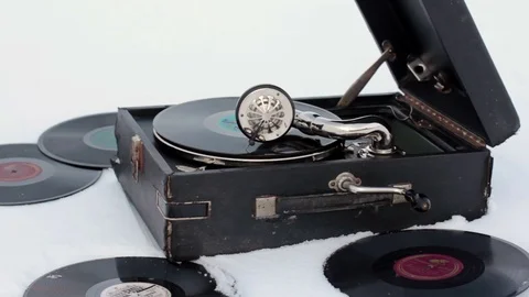 Old Gramophone Record Playing in the snow Stock Footage 71399644