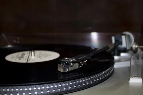 Old gramophone turntable with disc. Playing vinyl close up with needle on t.. Stock Photos