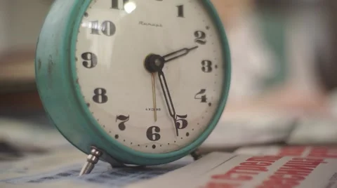 Old grandma's alarm clock is on the table. Stock Footage 64742834