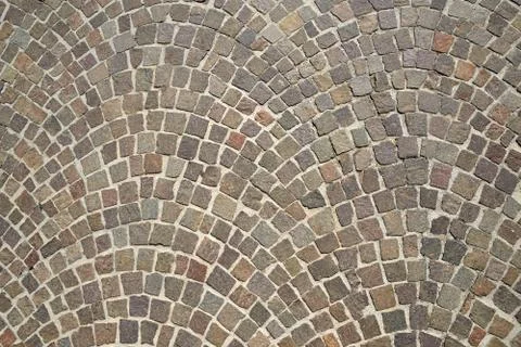 Old granite cobblestone pavement Stock Photos
