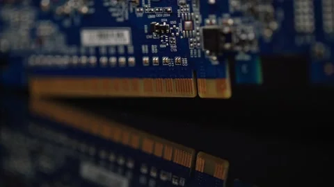 Old graphic card on a black background with gold contacts and microcircuit Stock Footage 146064660