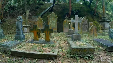 Old graveyard. Panoramic view of various gravestones, monuments, crosses. Stock Footage 64905692