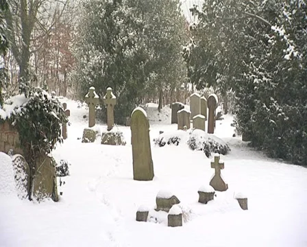 Old graveyard in the snow Stock Footage 32542160
