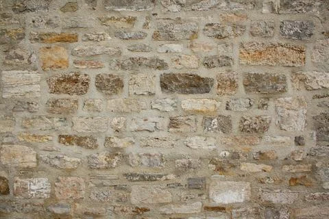 Old gray brick wall as background Stock Photos