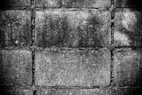 Old gray brick wall. Stock Photos