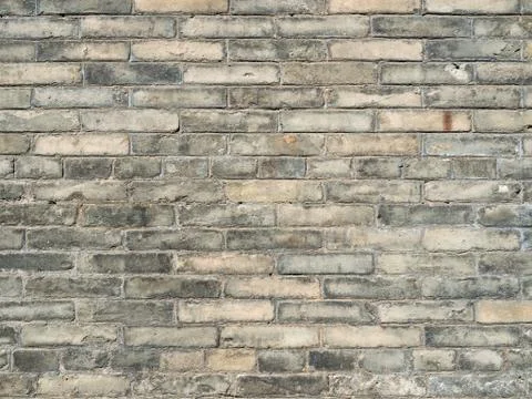 Old gray brick wall texture background Stock Photos