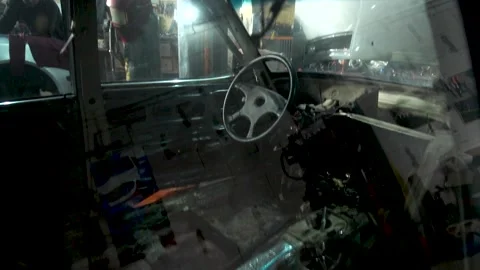 Old gray car inside Stock Footage 220874646