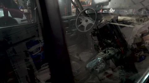 Old gray car inside Видео 220874662