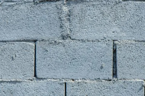 Old gray cement background with cinder block wall Stock Photos