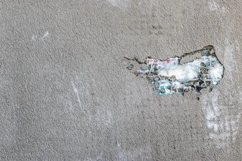 Old gray cement wall texture fragment with damaged plaster as abstract backgr 스톡 사진