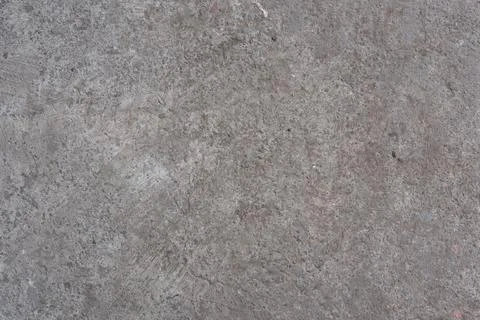 Old gray concrete surface with subtle textures and patterns 스톡 사진